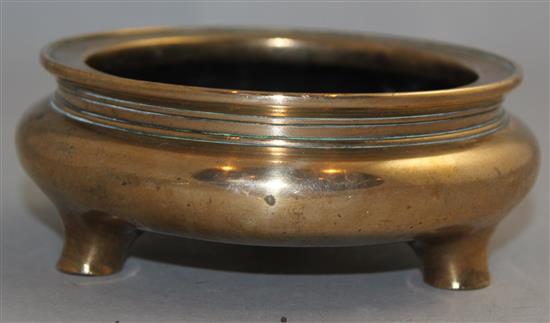 A Chinese bronze ding censer, Xuande four character mark, probably 17th / 18th century, 13.3cm